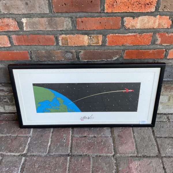 Framed Tintin lithograph print of the moon rocket leaving Earth.