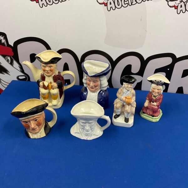 Vintage Toby Jug collection featuring Tony Wood character jugs.