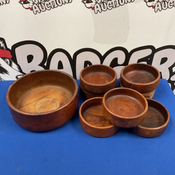 Set of hand-turned wooden bowls, rustic kitchenware.