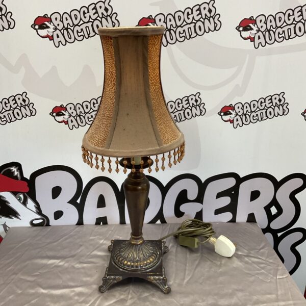Vintage TUV table lamp with tassel shade in bronze effect.