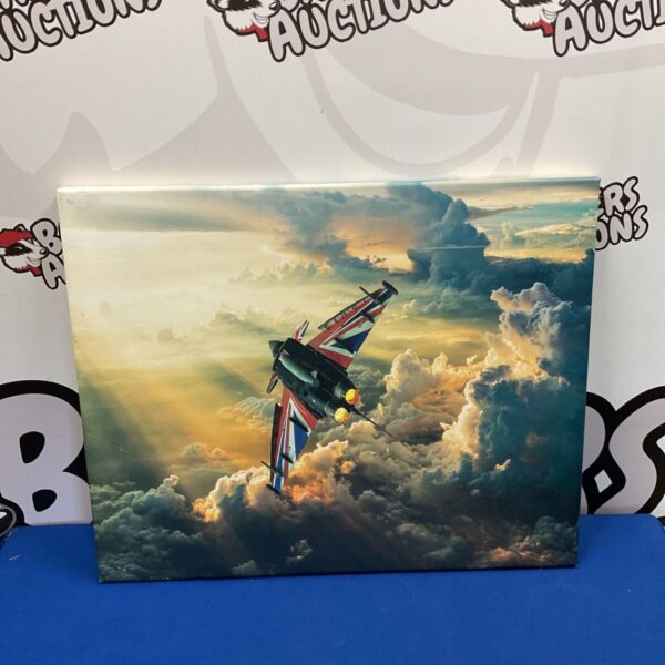 A vibrant canvas print of a Typhoon fighter jet in the sky.