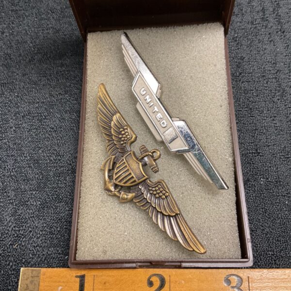 Vintage United Airlines and US Navy pilot badges for collectors.