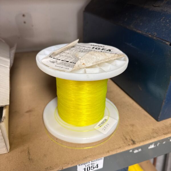 Yellow Varivas trolling line spool for sea fishing.