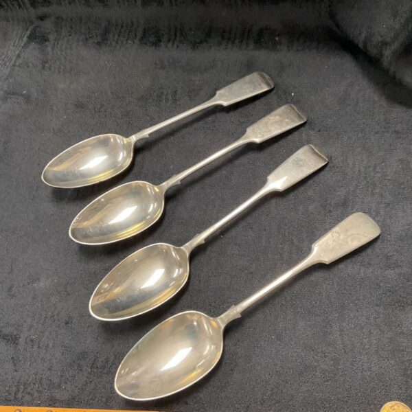 Antique Venetian silver serving spoons, a set of four.