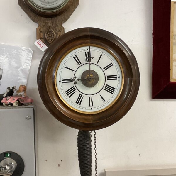 Victorian postman wall clock with weights and pendulum.