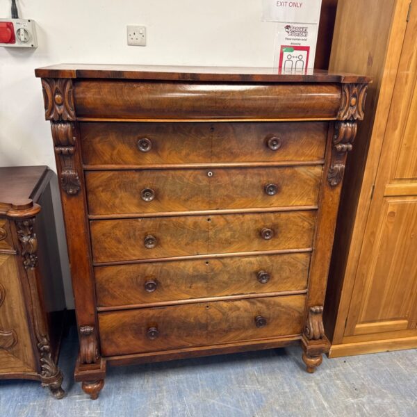 Antique Victorian chest of drawers with carved details and oggee frieze.