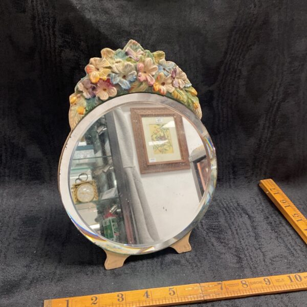 Ornate vintage Barbola mirror with floral detailing.