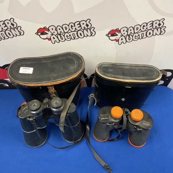 Vintage binoculars pair including Lieberman & Gortz and Mariner Deluxe.