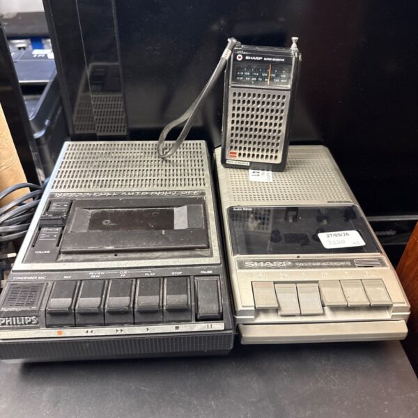 Vintage Sharp cassette recorder and portable radio.