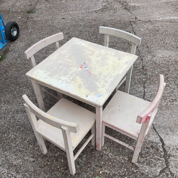 Vintage wooden child's table and four chairs set.