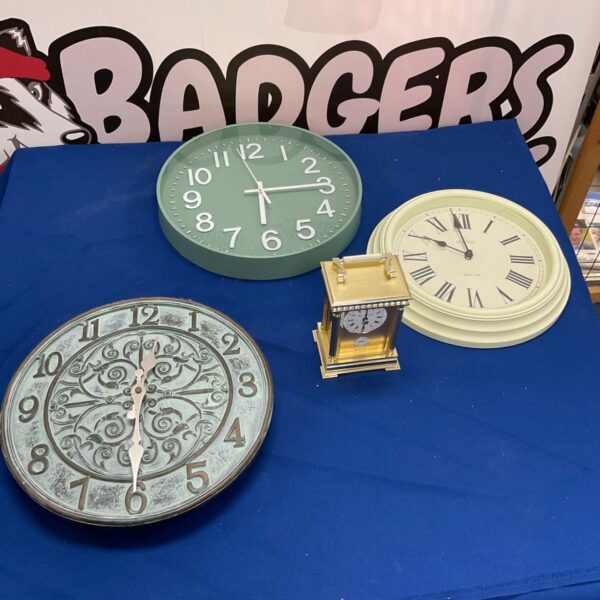 Vintage clock collection featuring Acctim and other timepieces.