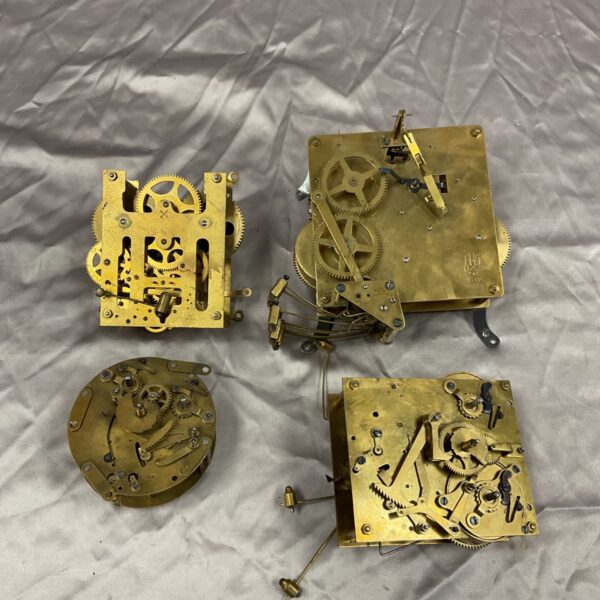 Vintage clock movements including FHS mechanism, antique horology.