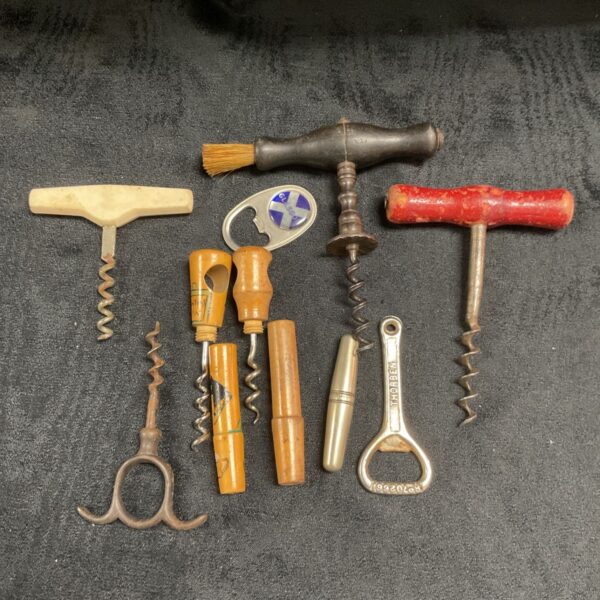 Vintage corkscrews and bottle openers collection for collectors.
