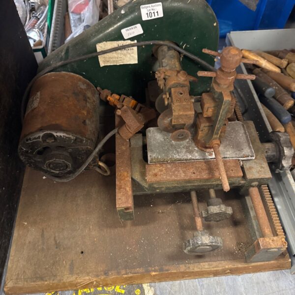 Vintage Davenport Burgess key cutting machine for locksmithing.