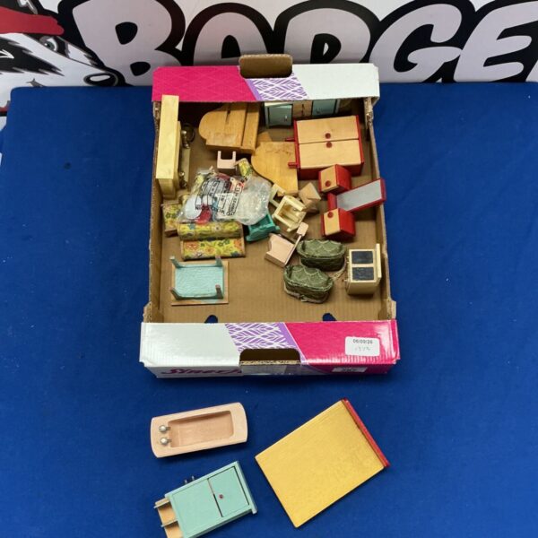 Box of vintage 1950s wooden dolls house furniture.