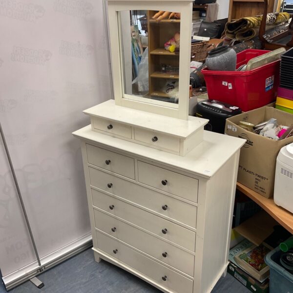 Vintage dressing table with mirror and drawers, bedroom furniture.