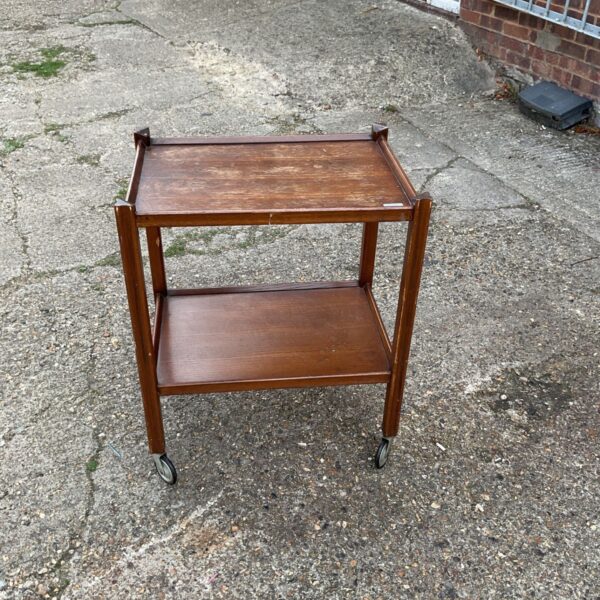 Vintage mahogany drinks trolley with three tiers.
