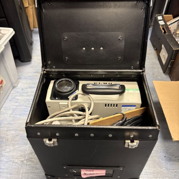 Vintage Elmo slide projector in its original carrying case.
