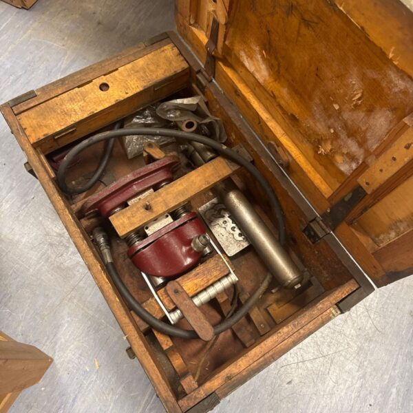 Vintage Epco hydraulic press inside its original wooden crate.