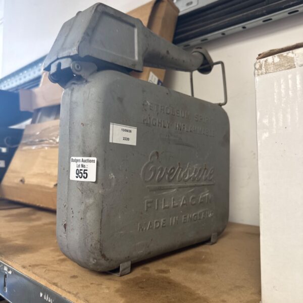 Vintage evergreen fuel can showing signs of age and wear.