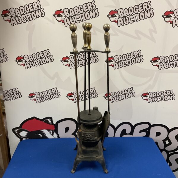 Vintage cast iron fireplace companion set with tools.