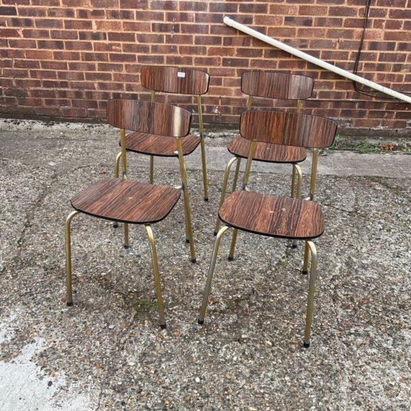 Set of four vintage Formica chairs with chrome legs.