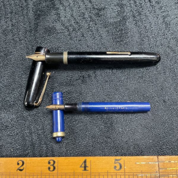 Vintage fountain pen pair, Swan and Dinkie Conway Stewart with gold nibs.