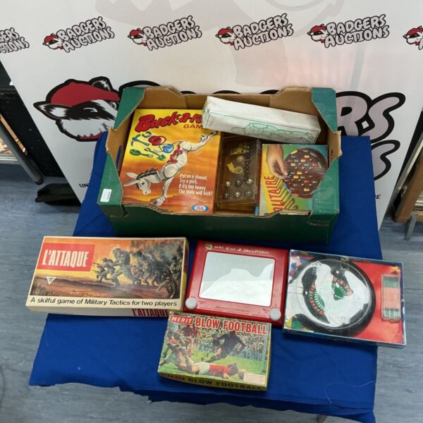 Vintage games lot including Etch A Sketch and blow football.
