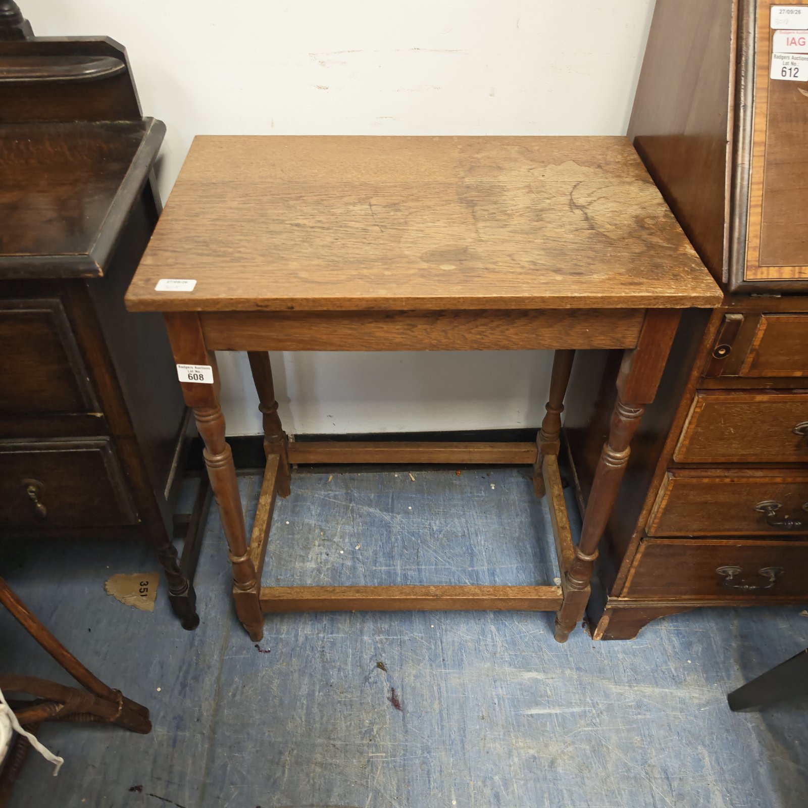 Vintage wooden hall table with shelf and turned legs.