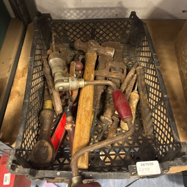 Vintage hand tools lot including hammer and hand drill.