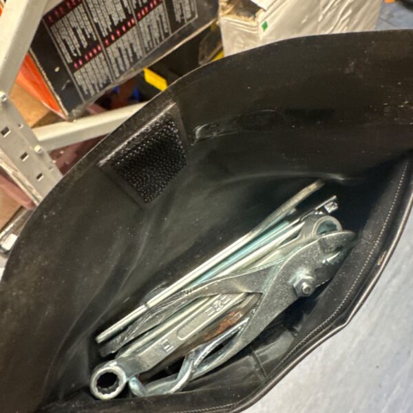 Vintage Honda wrench from a tool kit, showing signs of age.