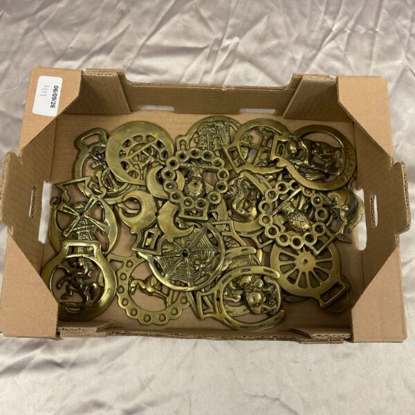 Vintage horse brasses lot, antique equestrian brass ornaments.