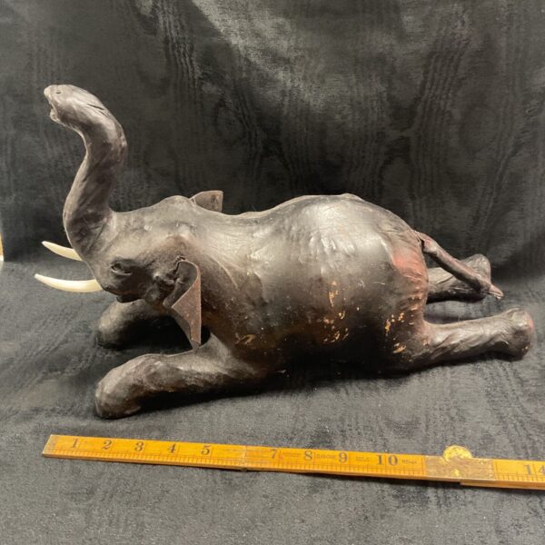 Vintage leather elephant figurine, mid-century modern style.