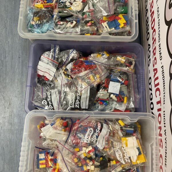 Vintage Lego lots in crates, assorted bagged building blocks.
