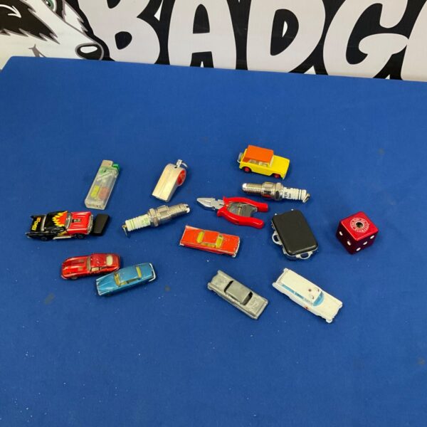 Vintage lighter and car lot including a Husky toy car.