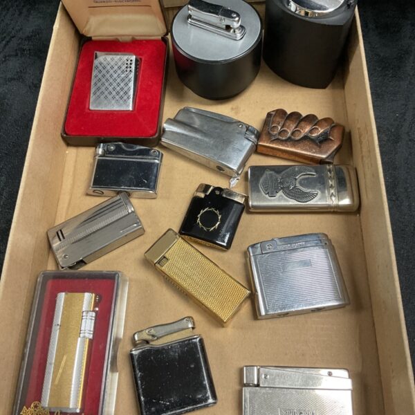 Vintage lighters collection including Collibri brand, ideal for collectors.