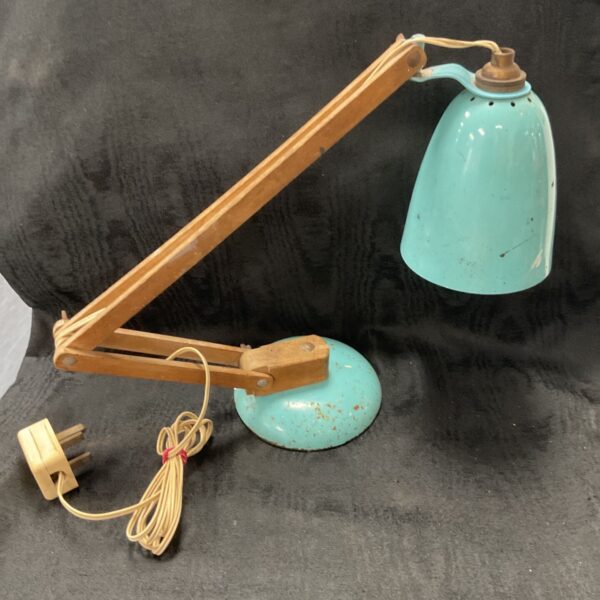 Vintage Maclamp desk lamp with adjustable arm and blue shade.