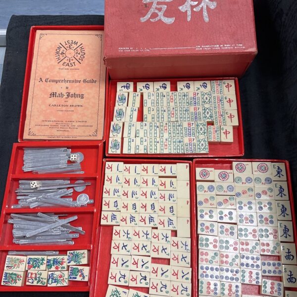 Complete vintage Mahjong set with box and tiles.
