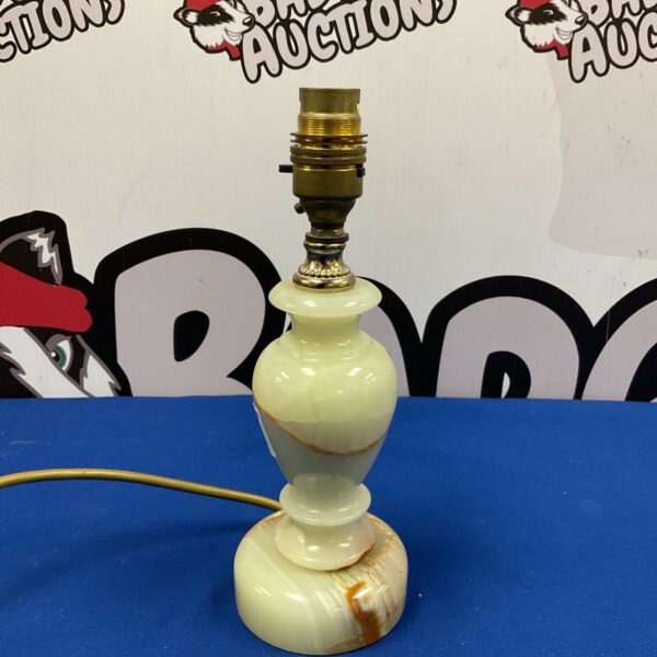 Vintage marble table lamp with elegant veining and classic design.