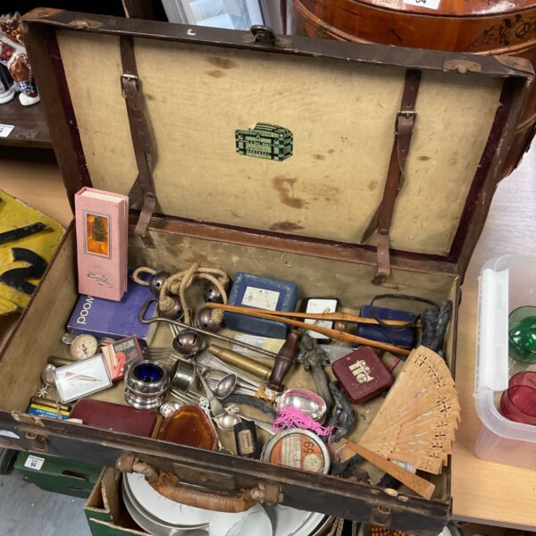 Vintage McLeod Hawthorne leather case filled with silver plate and curios.