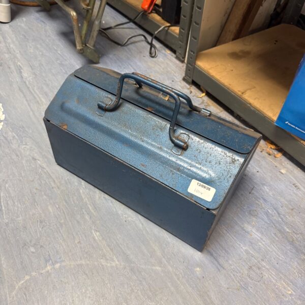 Vintage metal toolbox with a hinged lid and carrying handle.