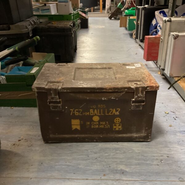 Vintage military ammunition box marked 7.62mm BALL L2A2 for storage.