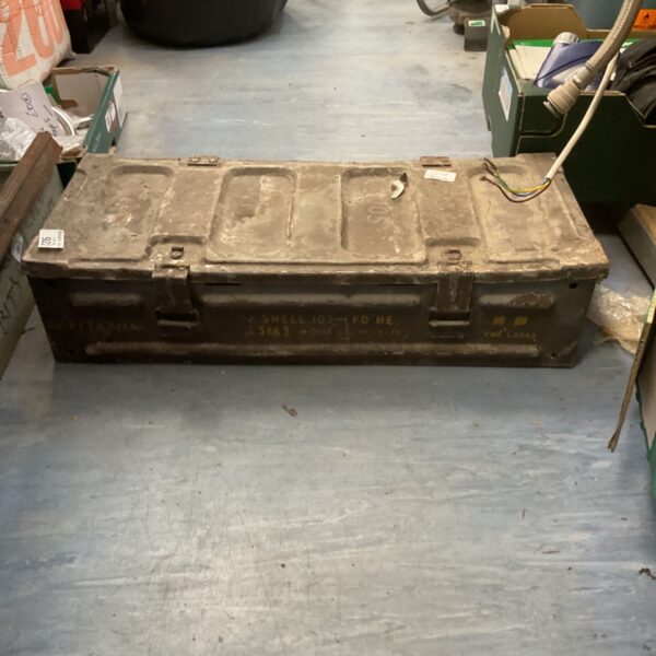 Vintage military ammunition box, metal storage container, showing wear.