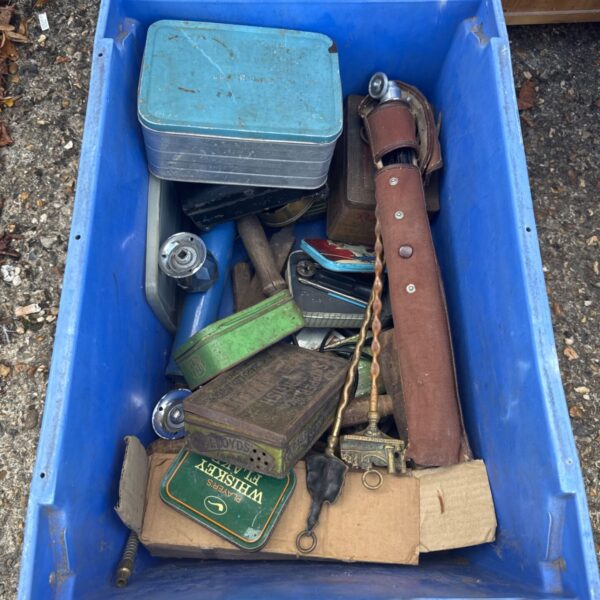 Vintage mixed lot in a blue crate with tools and tins.