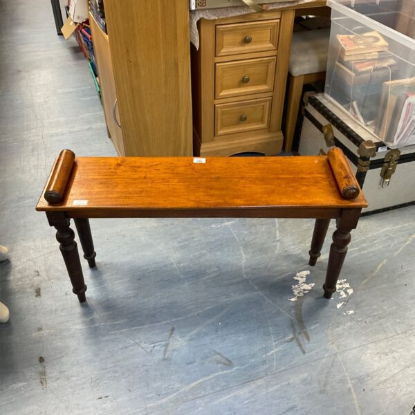 Vintage oak bench with turned legs, ideal for hallways.