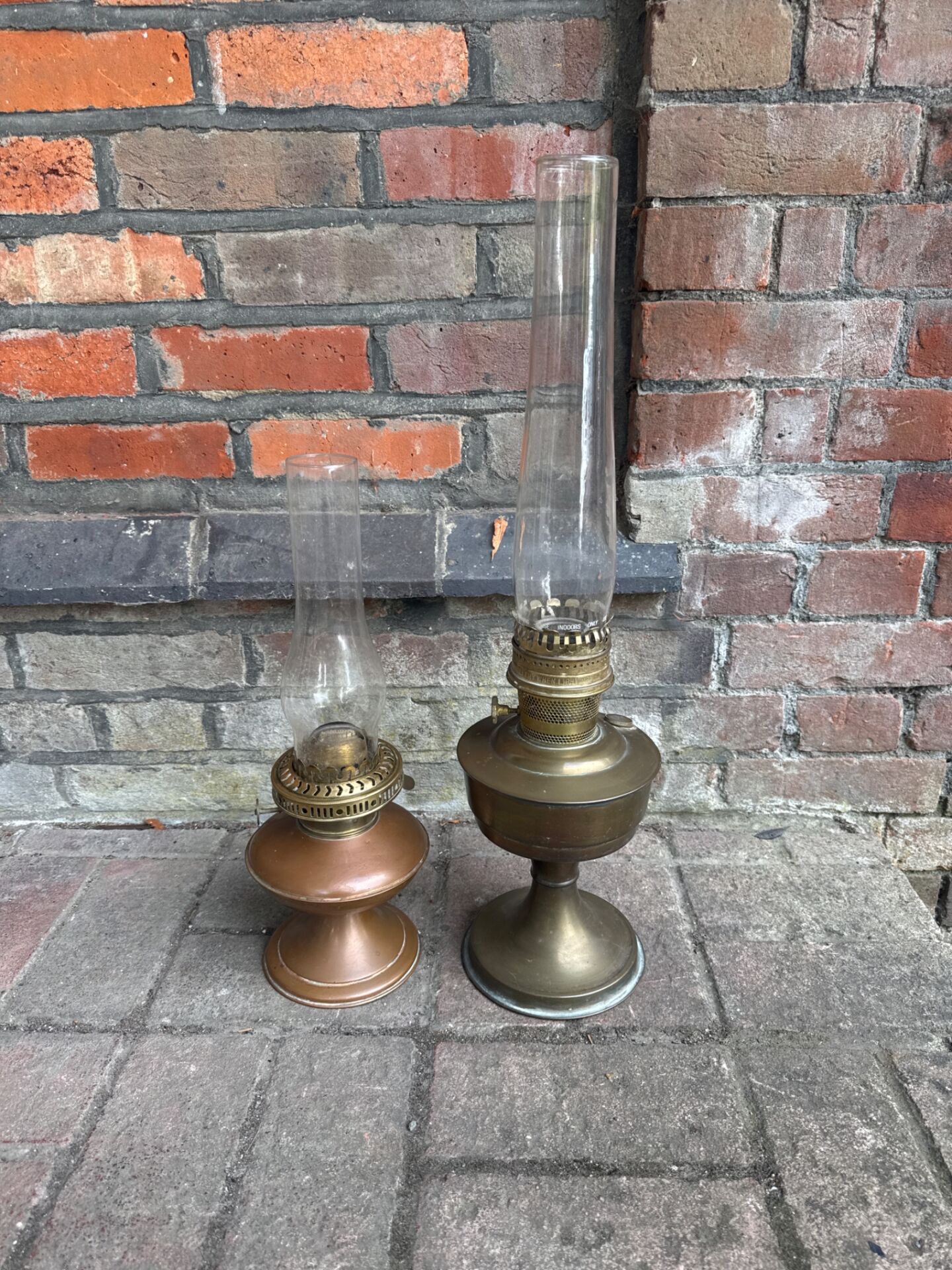 016 Two vintage paraffin lamps with glasses including Aladdin