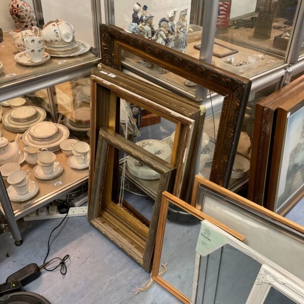 Vintage lot of ornate picture frames and mirrors for home decor.
