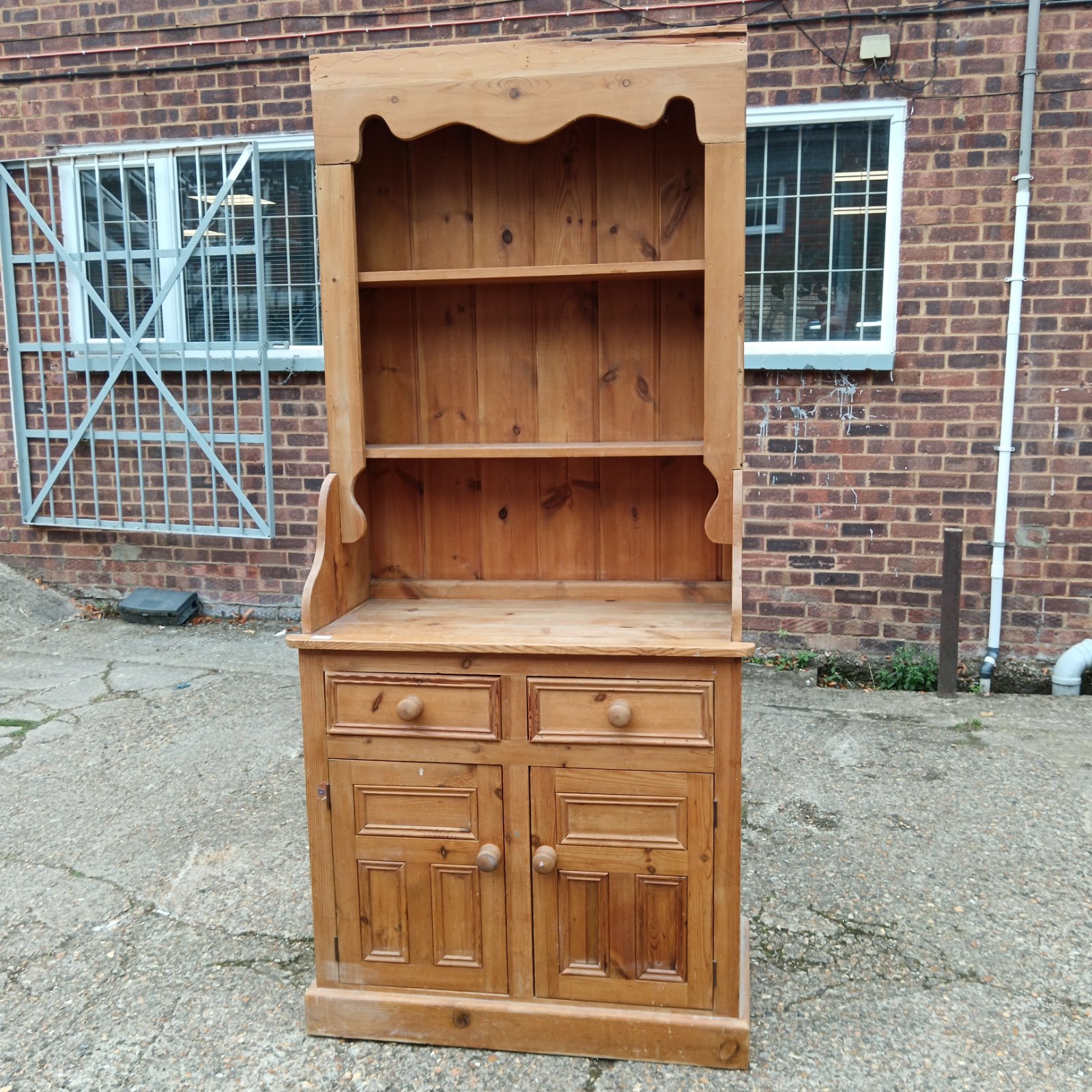 Small vintage pine Welsh dresser for kitchen storage.