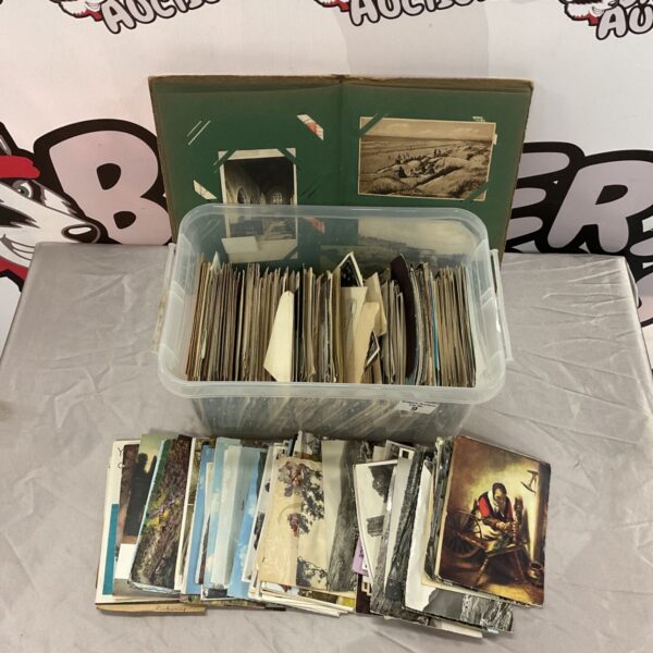 Vintage postcard collection with various antique cards.
