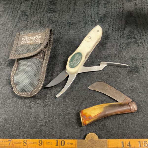 Vintage pruning knife set with Wilkinson Sword shears and pouch.